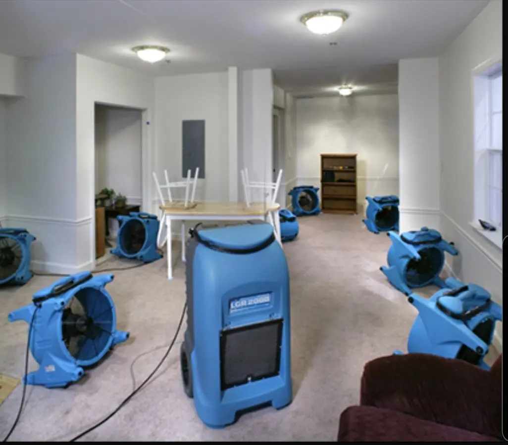 Air movers and dehumidifier setup for Water Damage Restoration in Paw Paw